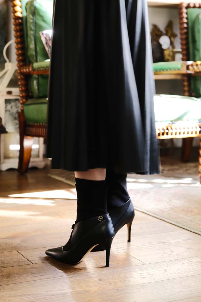 Chic and Easy: Slip-On Snake Print Leather Boots