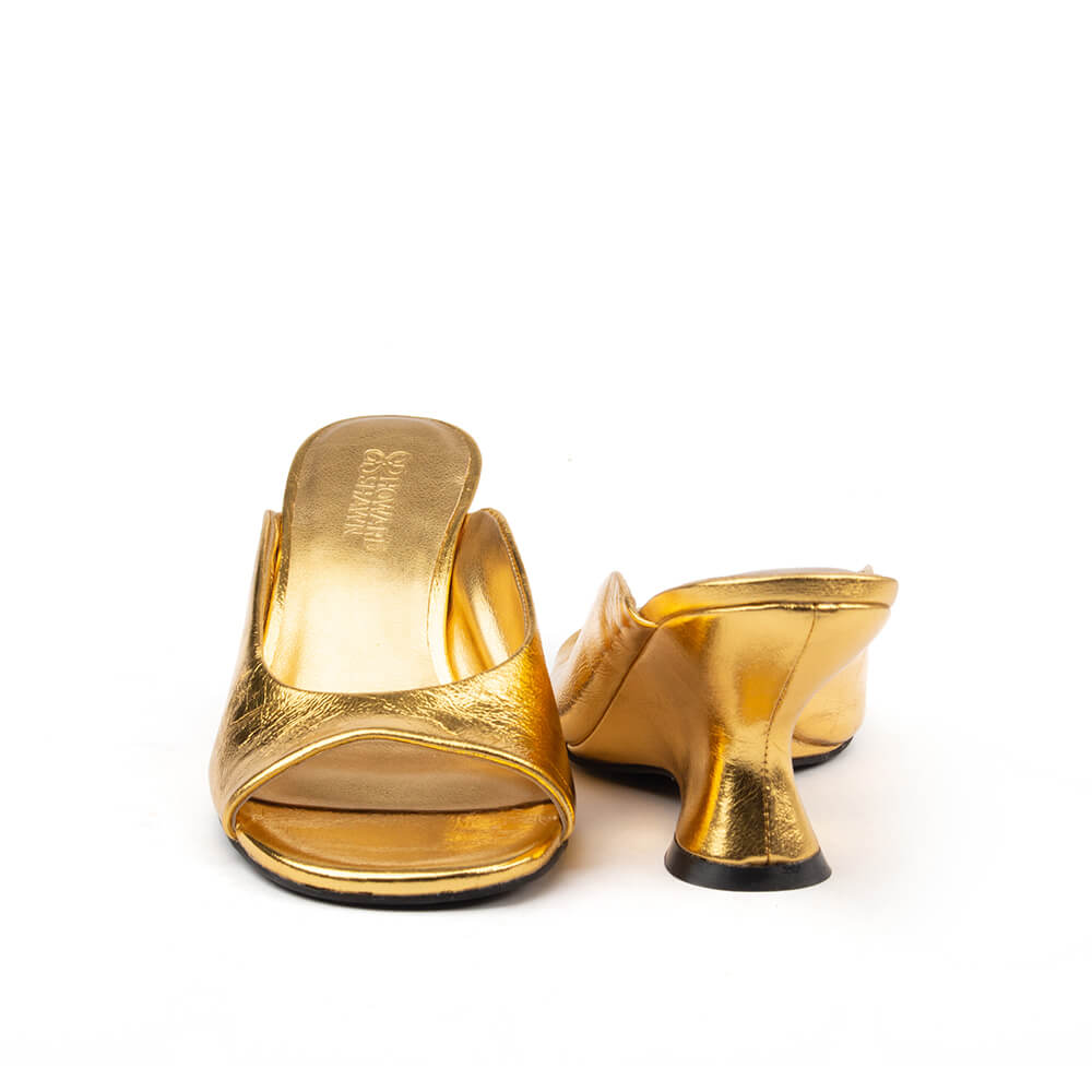 Women's statement gold mules crinkled metallic leather sculpted wedge