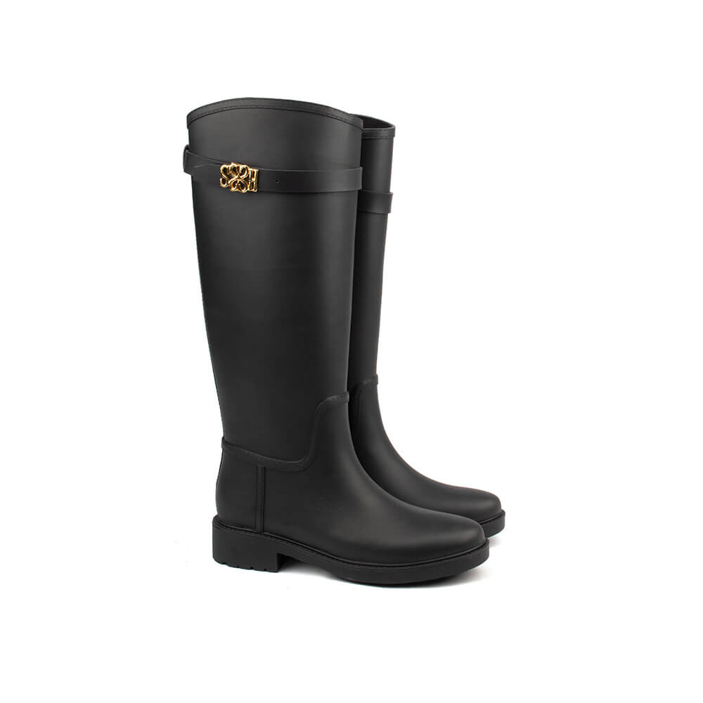 Black rubber knee-high wellington boots gold Howard Shawn logo strap