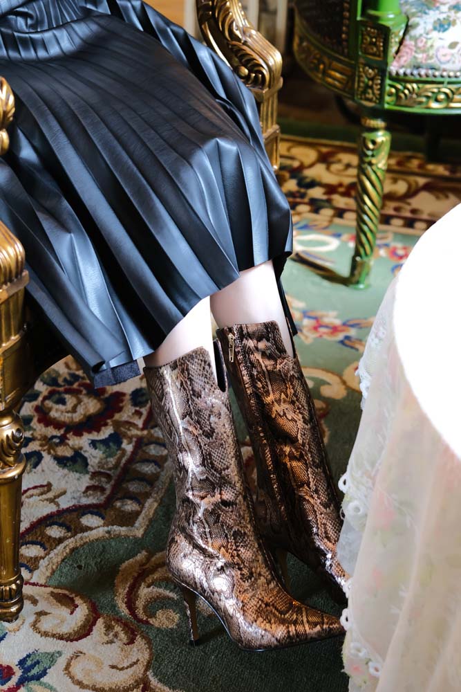 Embrace the Exotic with Snake Print Boots