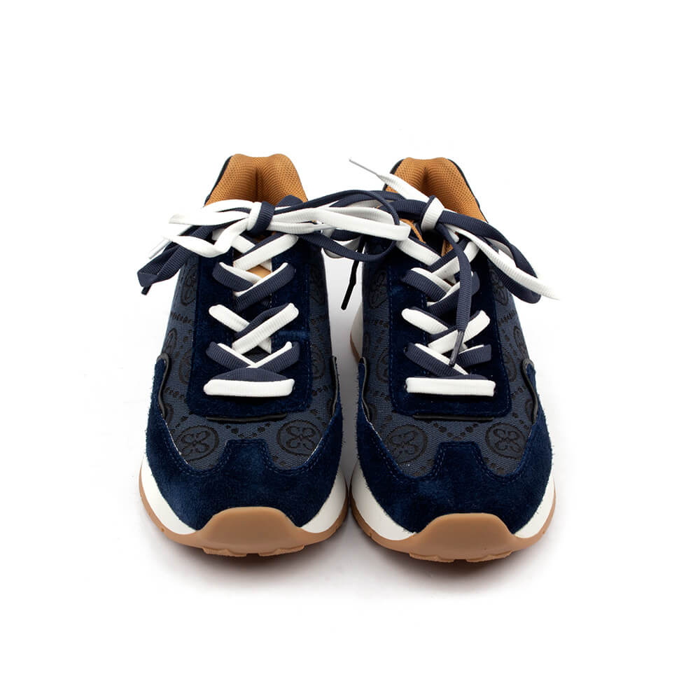 Women's navy blue chunky sole sneaker with all-over monogram print and suede