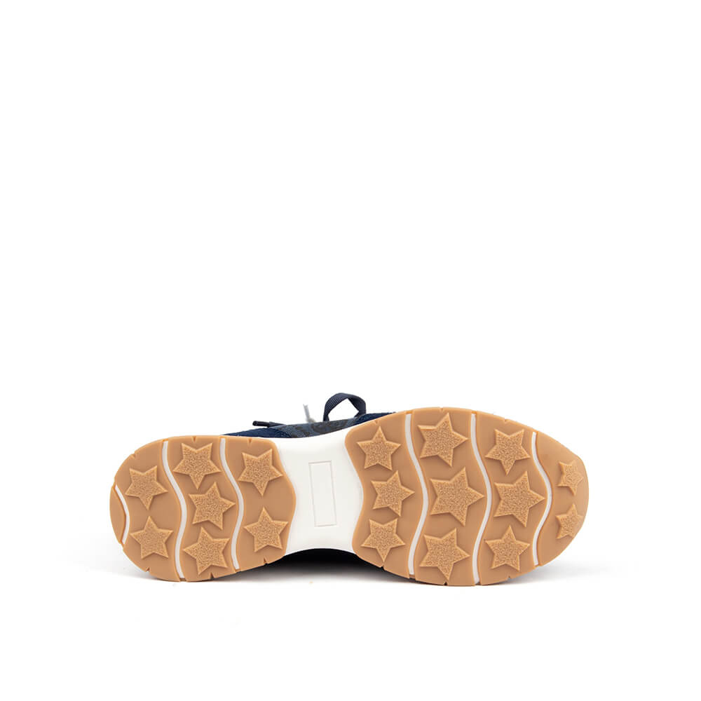 Navy jacquard monogram and suede paneled sneaker with white laces and gum sole