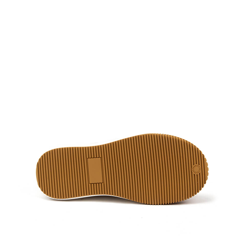 Retro-style chunky platform sneakers in sand white — side view with logo