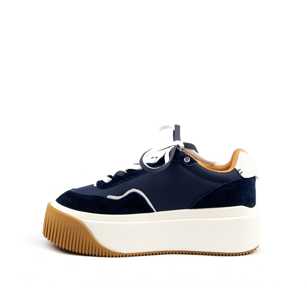 Chunky sole trainers in navy blue suede and leather with white platform base