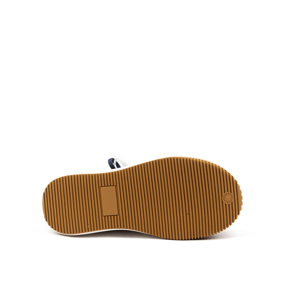 Women's retro-style navy platform sneakers with chunky gum sole — bottom view