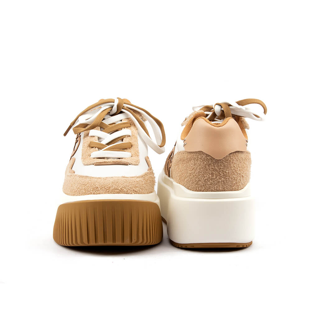 Women's chunky platform sneakers with suede panels and signature brand logo