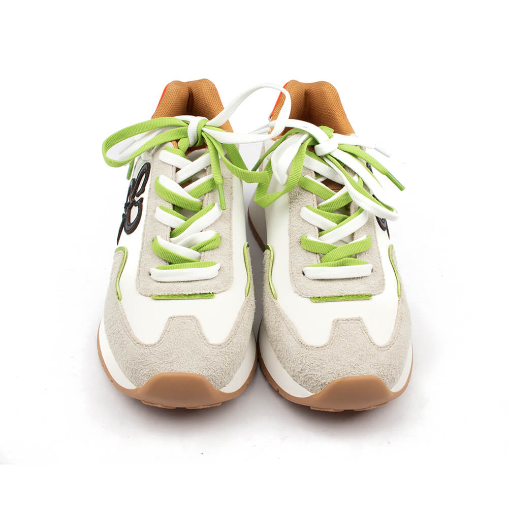 Mixed material runner sneakers in white with neon green trim and orange detail