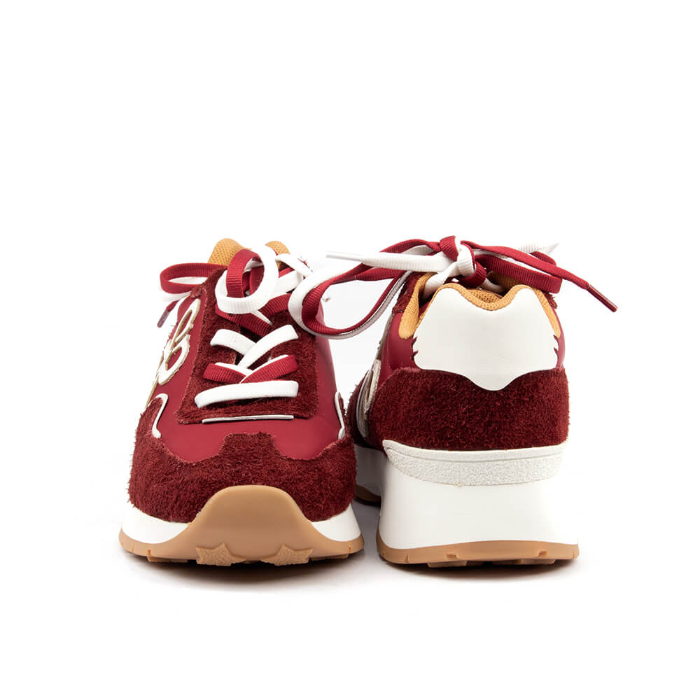 Dark red and white mixed material sneakers with large logo emblem at side