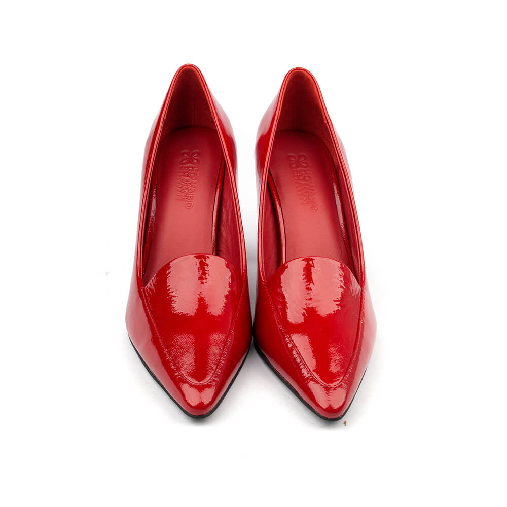 Red patent court shoes with sharp pointed toe and slender heel