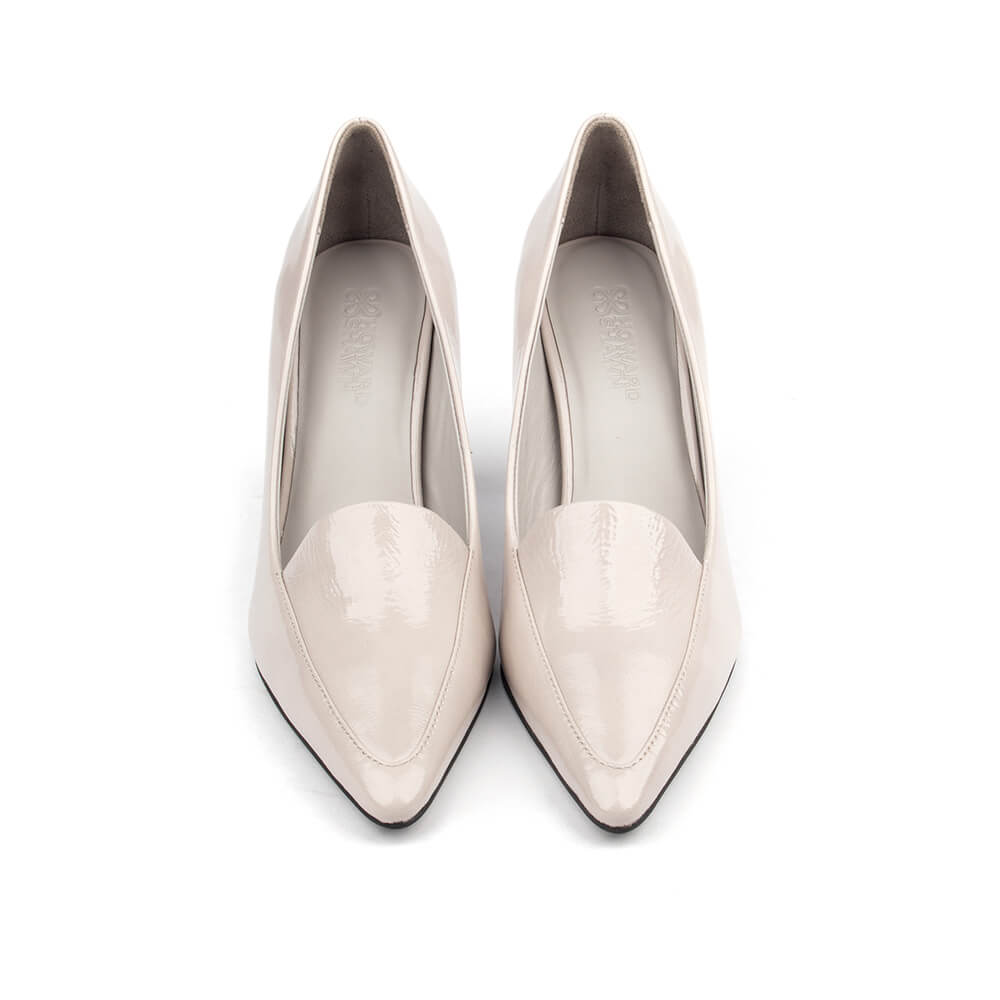 Off-white patent court shoes with sharp pointed toe and slender heel