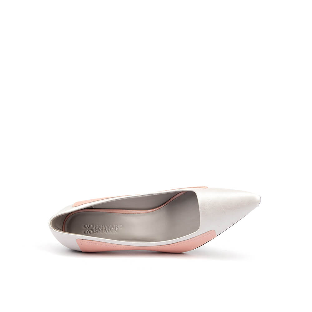Colour-block pointed toe pumps in pearl white and blush pink — side view