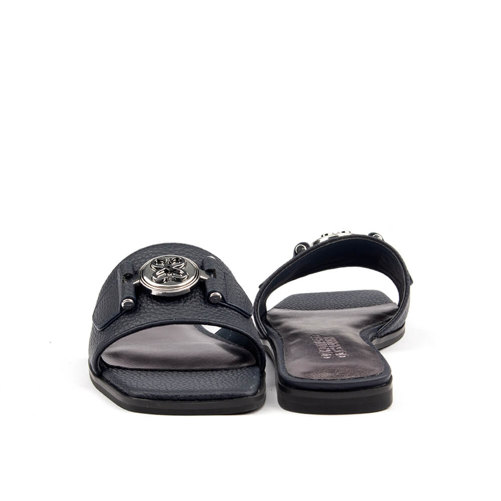 Women's navy pebbled flat slide sandal silver logo overhead top view shot