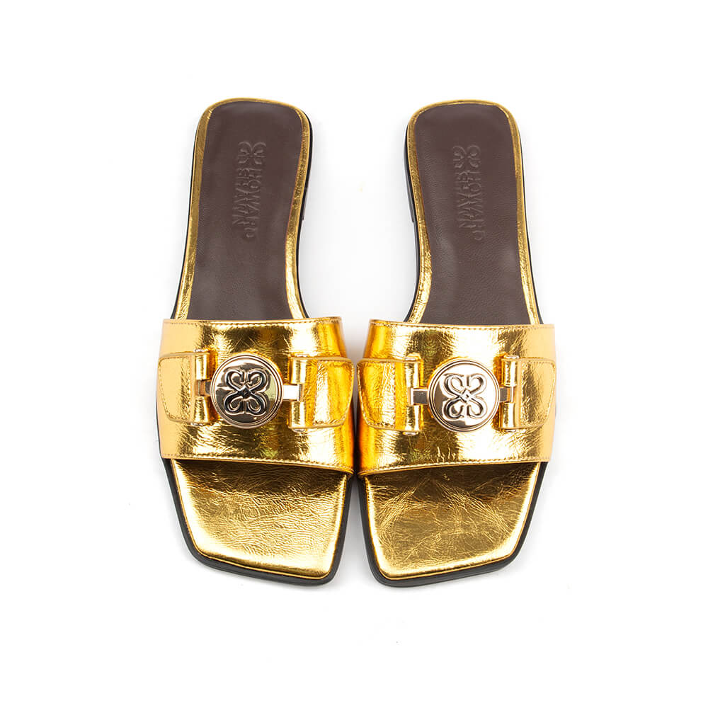 Women's gold metallic flat slide sandal logo medallion buckle square toe summer