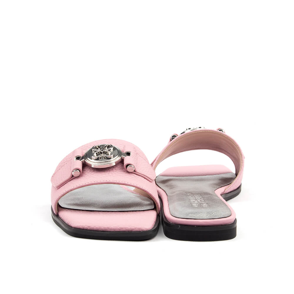 Women's blush pink pebbled leather flat slide sandal silver logo medallion