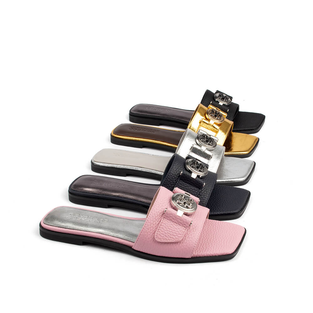 Chic grainy flat slide sandal logo silver hardware top view overhead