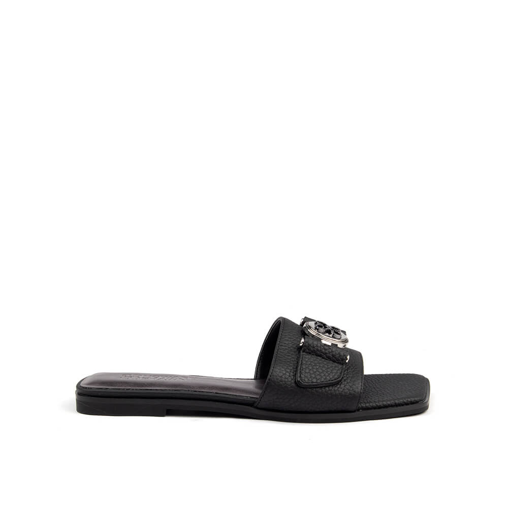 Black pebbled leather flat slide sandal with silver logo medallion and square toe