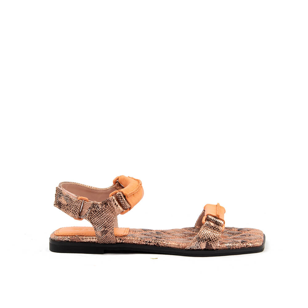 Snake embossed flat sandals in brown python print with peach buckle strap