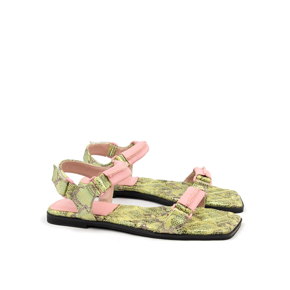 Women's flat summer sandals with yellow-green snake print and pink ankle strap