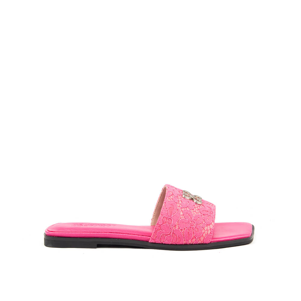 Floral lace flat slide sandals in fuchsia pink with silver logo hardware