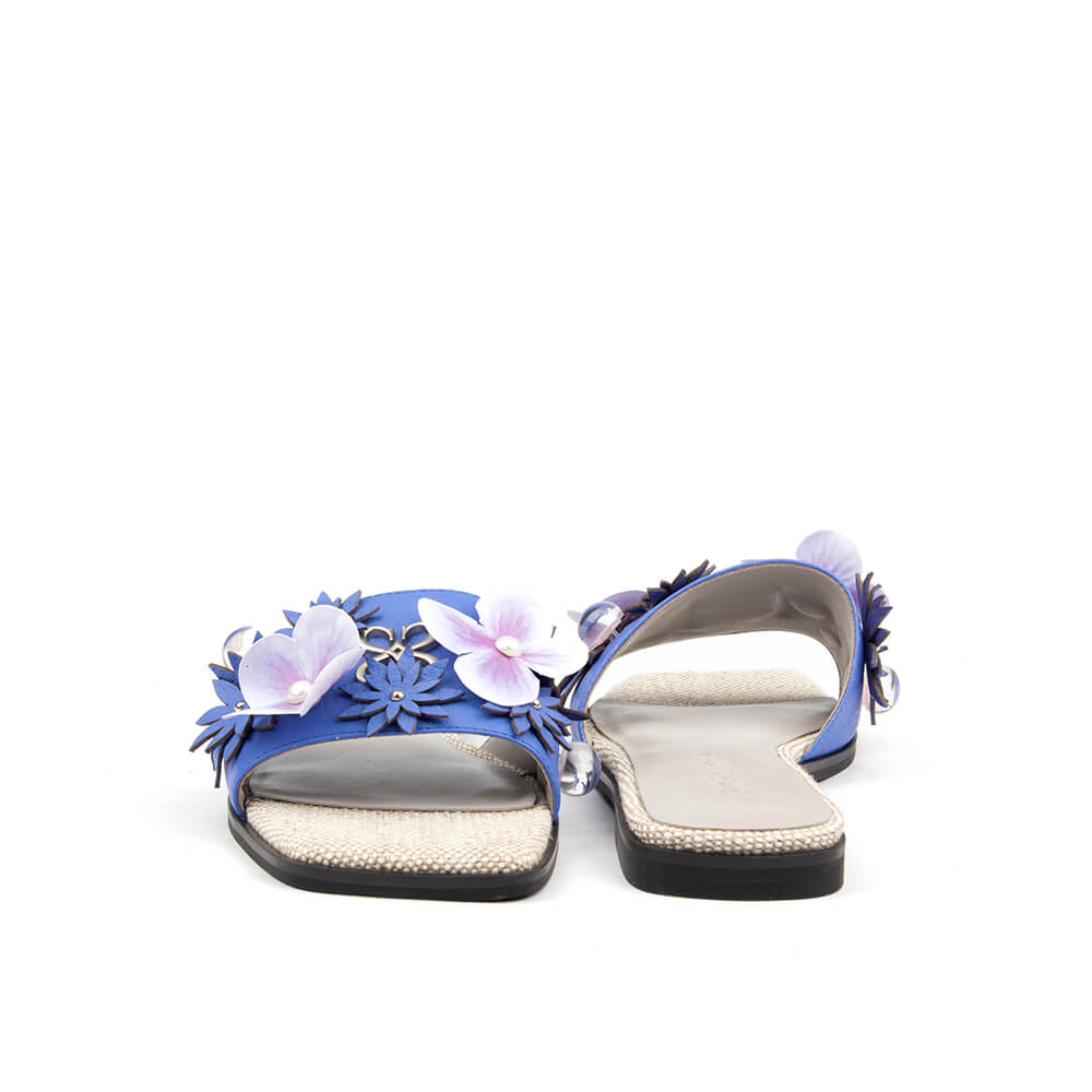 Women's blue embellished summer sandals with 3D flowers and rhinestone footbed