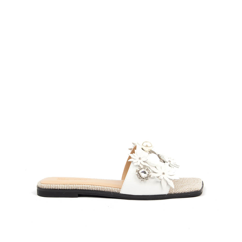 3D floral flat slide sandals in white with crystal brooch and pearl detail