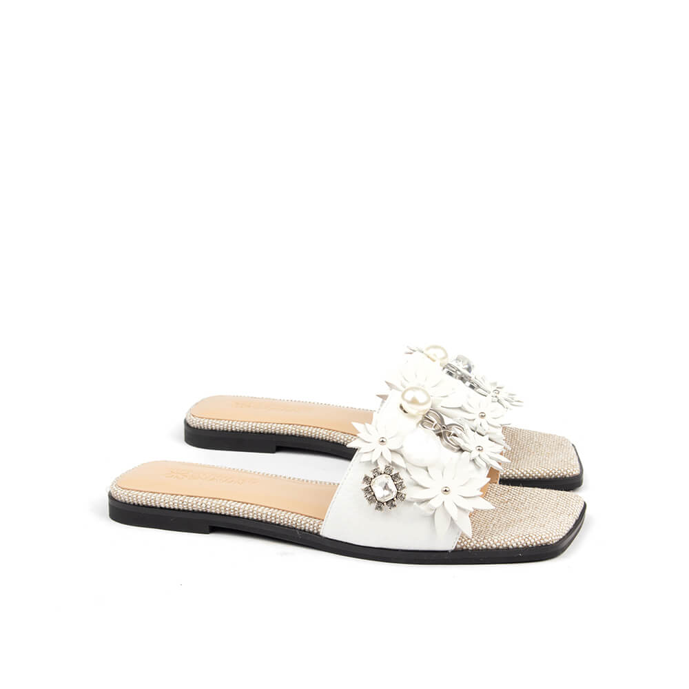 Women's flat mule sandals with white leather flower appliqués and rhinestone footbed