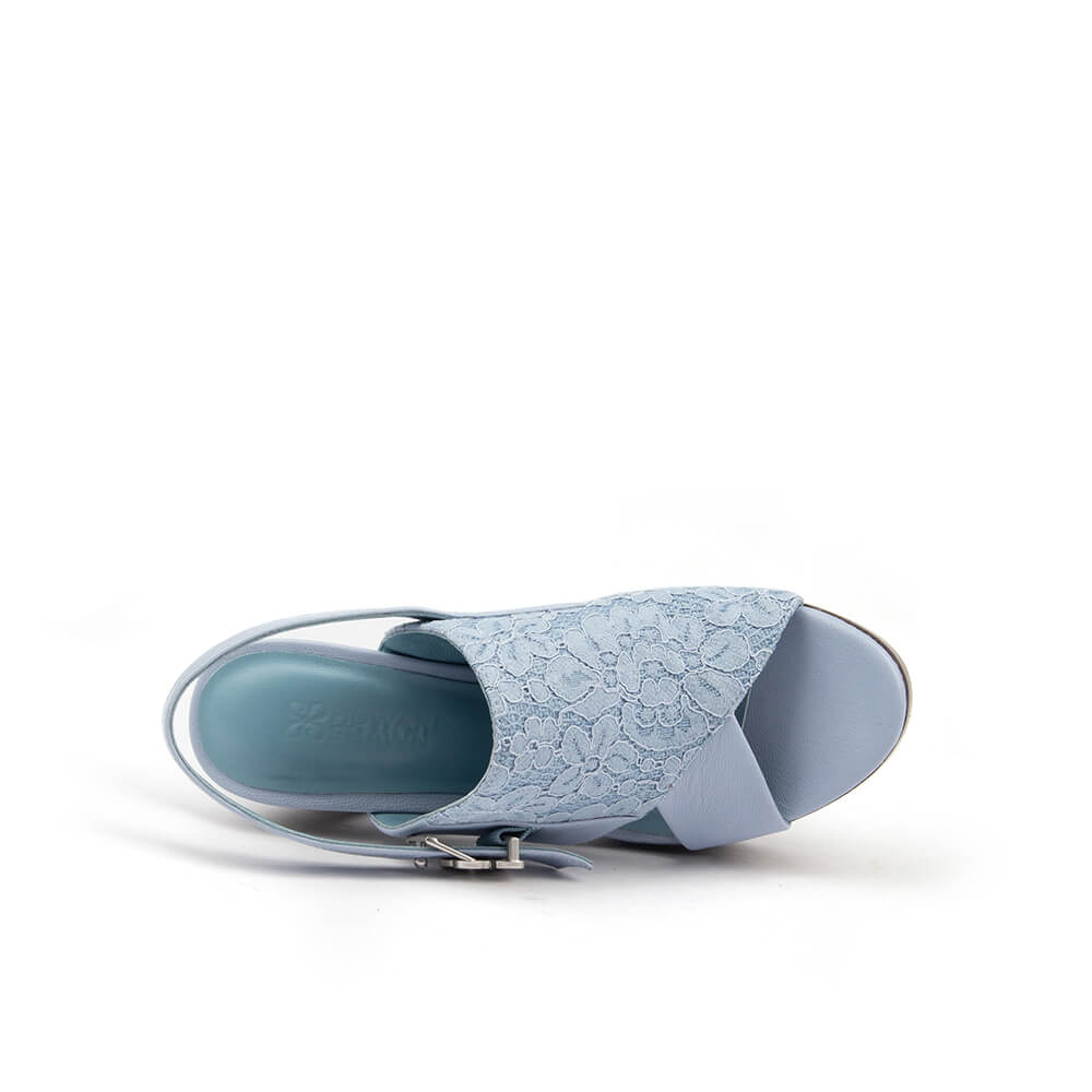 Light blue open toe slingback with lace panel and silver logo buckle — side view