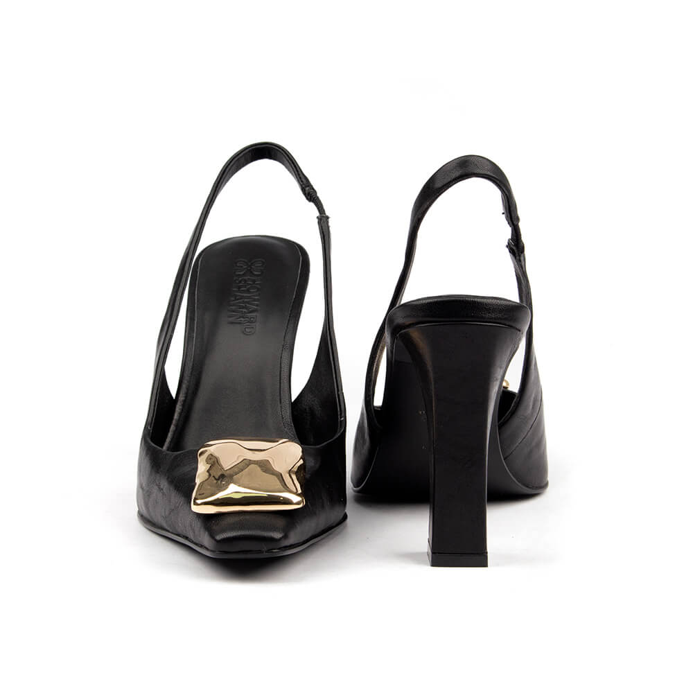 Black leather block heel slingback shoes with polished gold toe accent — side view