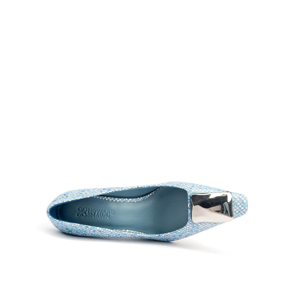 Blue glitter pointed toe pumps with metal hardware accent — side view
