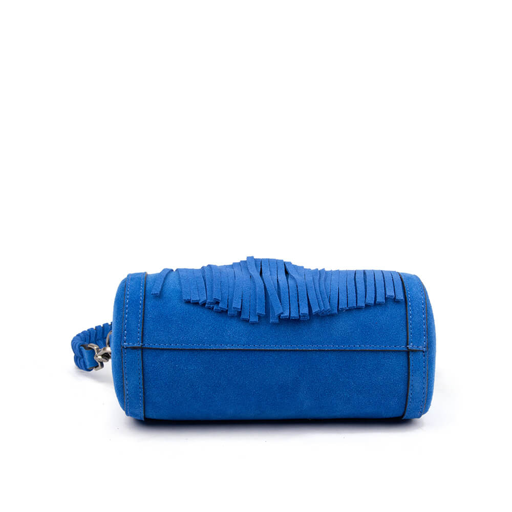 Vibrant cobalt blue mini bag with fringe panel and top handle