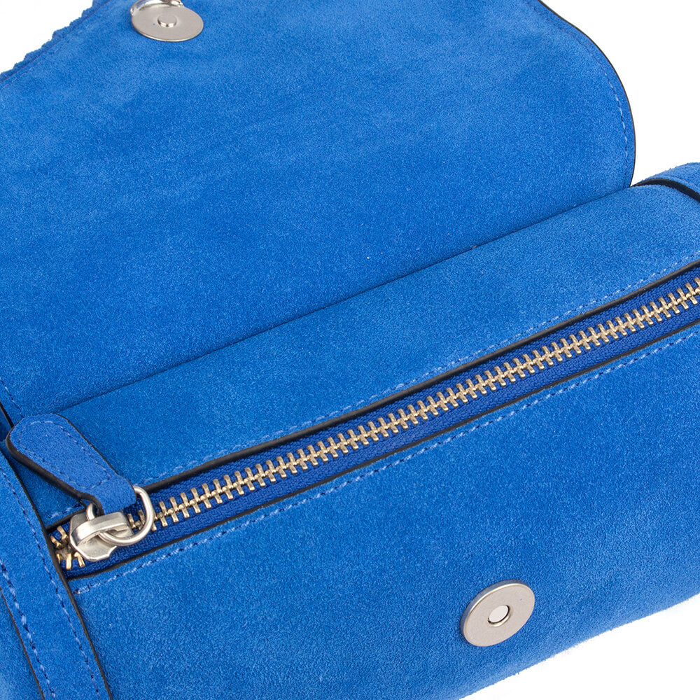 Women's statement crossbody bag in electric blue suede with fringe detail
