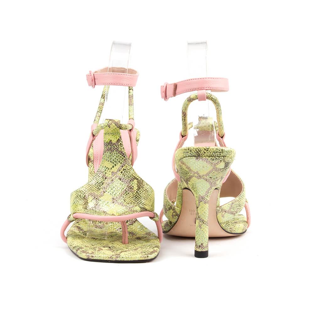 Open toe stiletto sandals with snake print and pink ankle strap