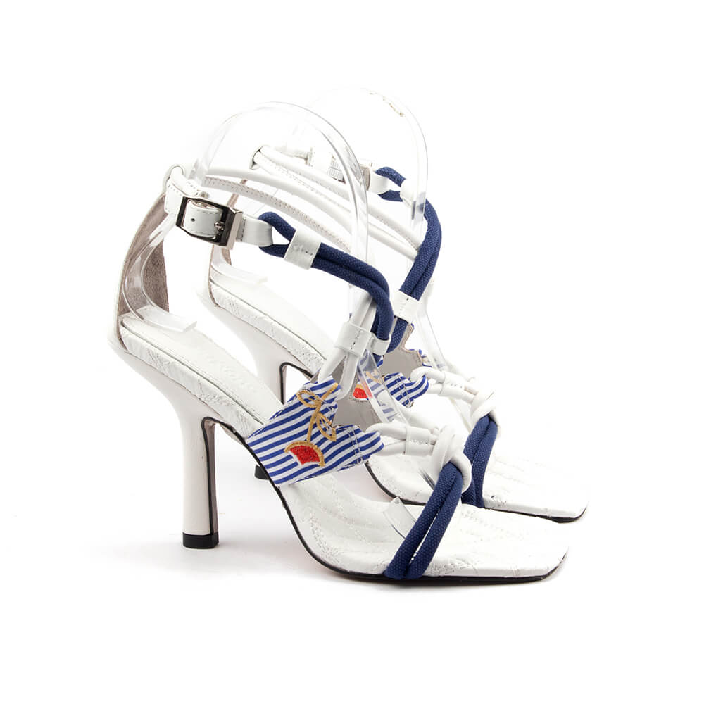 Crisp white leather heels with navy rope knot strap detail