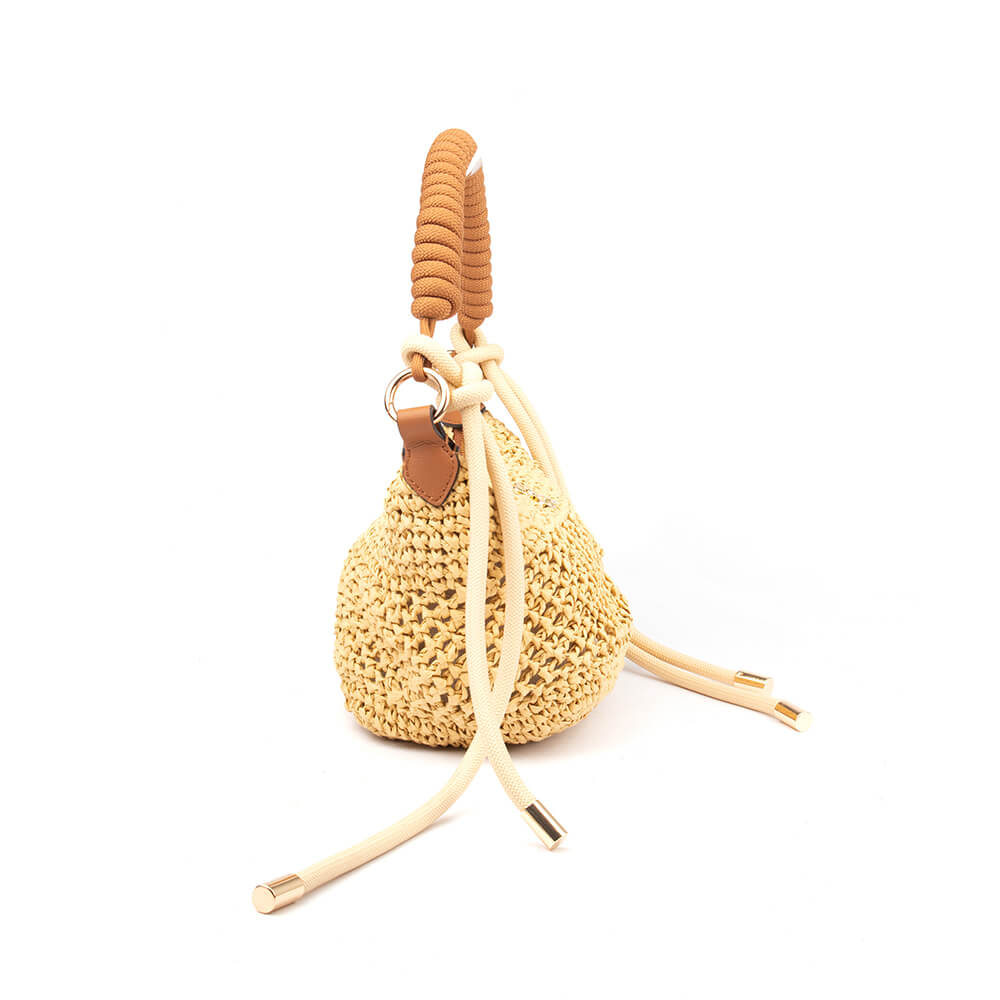 Boho beach bag with crochet body and coiled tan rope handle
