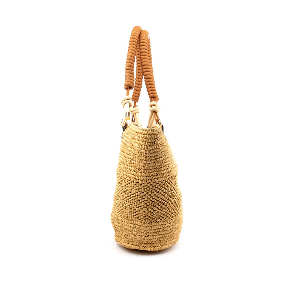 Natural straw open-weave beach tote with tan coiled handles and leather connectors