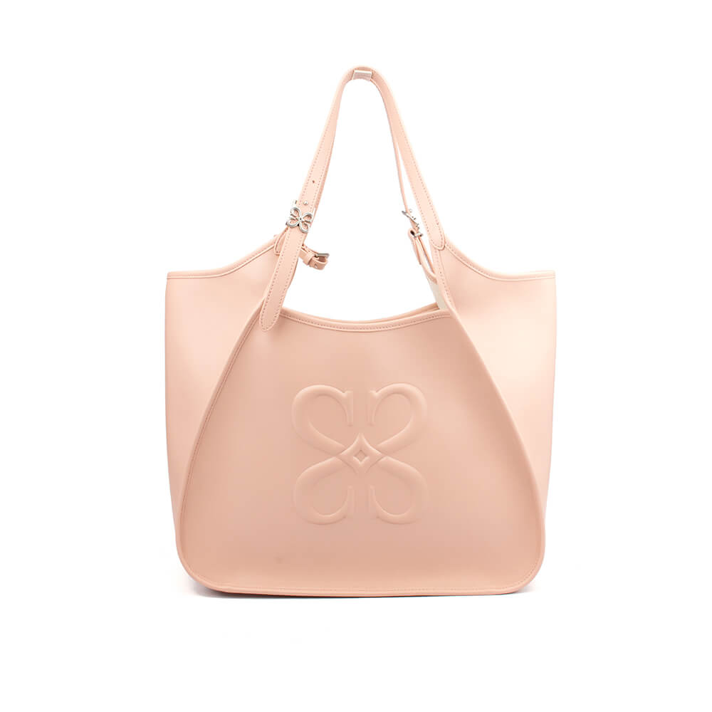 Blush pink leather tote bag with embossed logo and silver hardware