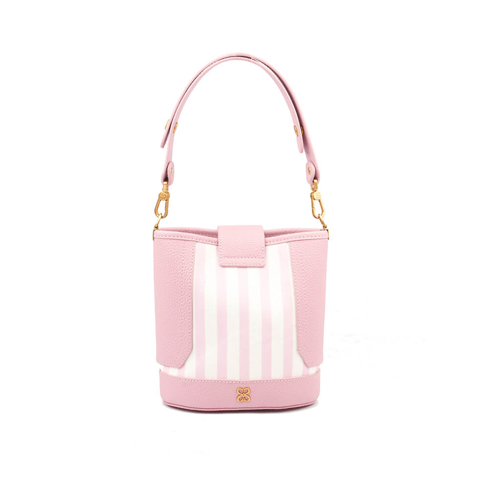 Women's blush pink bucket bag with stripe detail and gold swivel clip hardware