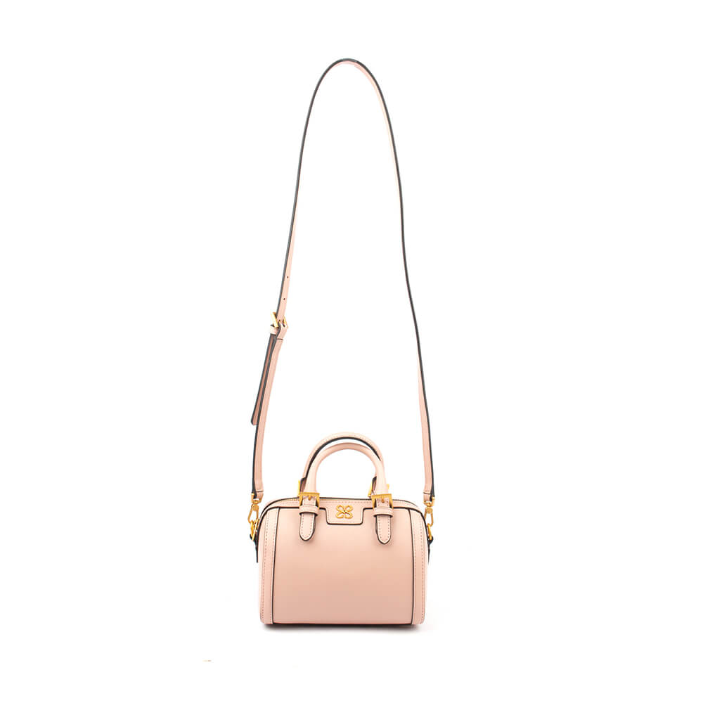Cute mini pale pink top handle satchel with logo charm and gold buckle detail