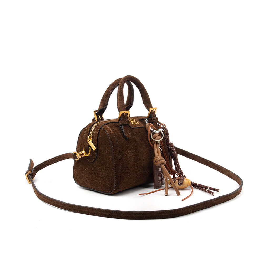 Cute brown suede mini handbag with fun charms for casual everyday style