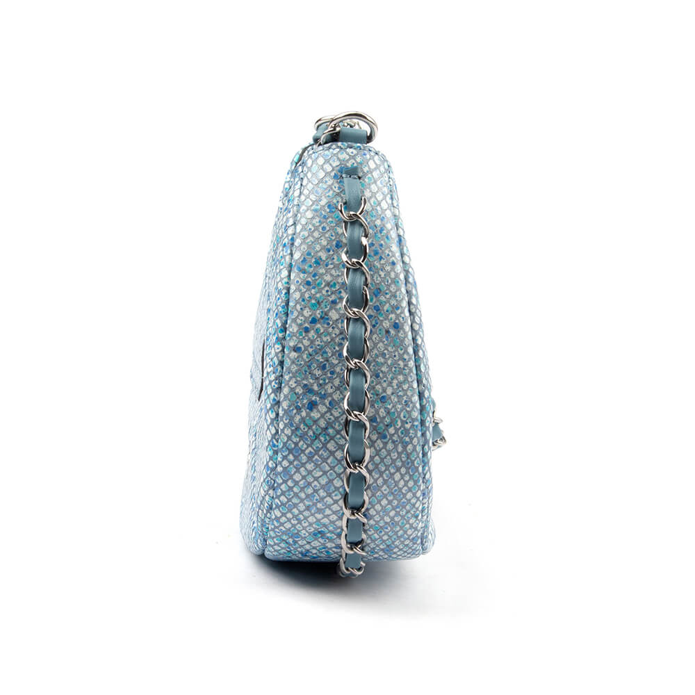 Sequin snake print blue crescent bag with woven silver chain and chunky clasp