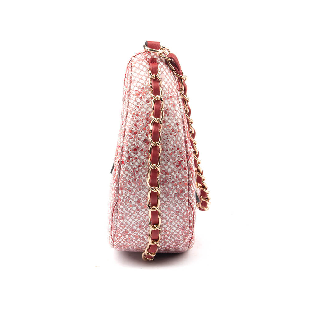 Quilted pink tweed crescent bag with woven gold chain and chunky gold clasp