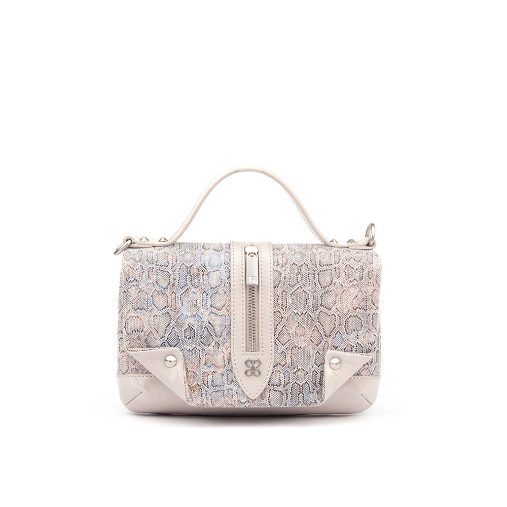 Snake embossed mini flap bag in pearl white with silver hardware and stud corners