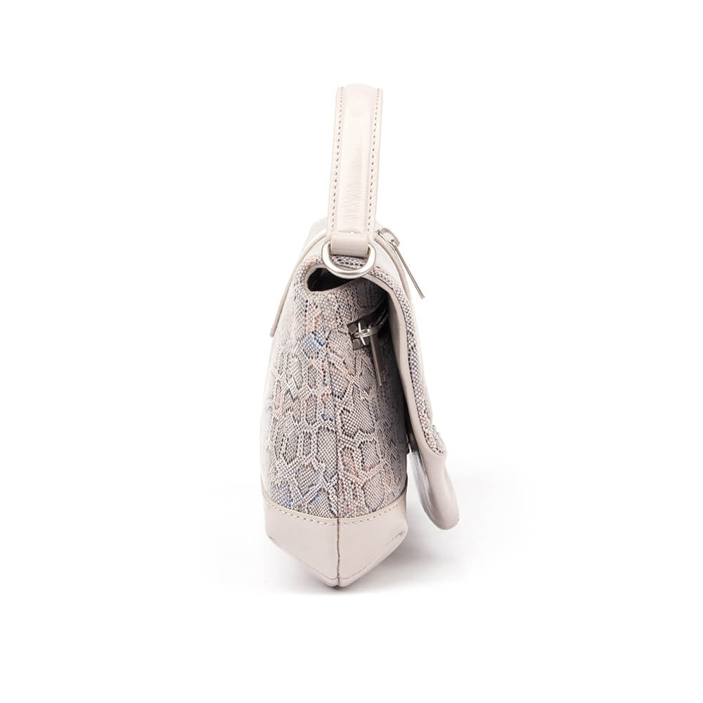 Pearl snake mini top handle bag with logo emblem and stud corner accents