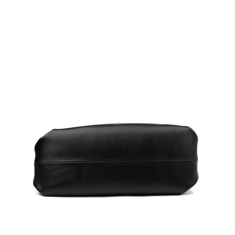 Smooth black leather crescent hobo bag with bold gold-tone hardware
