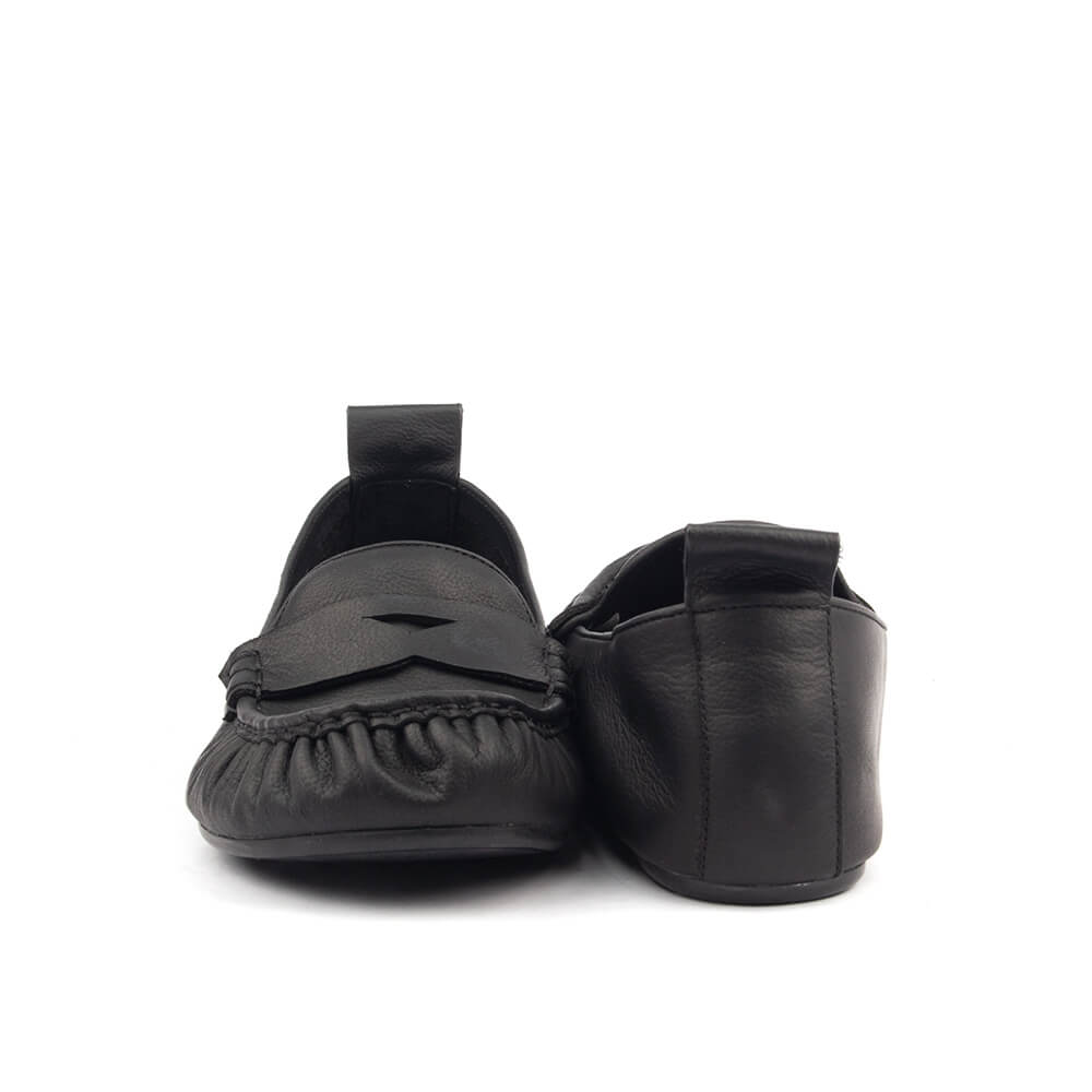 Black women's flat loafer with classic penny strap