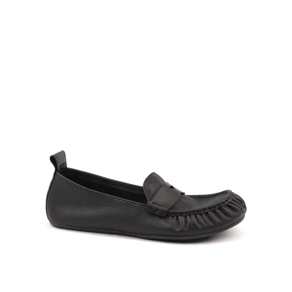 Women's black leather penny loafer flats side view