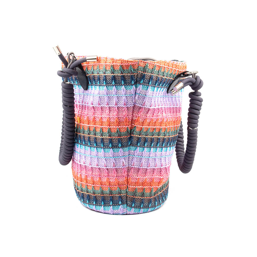 Women's colorful woven fabric tote bag with rope handles and silver hardware