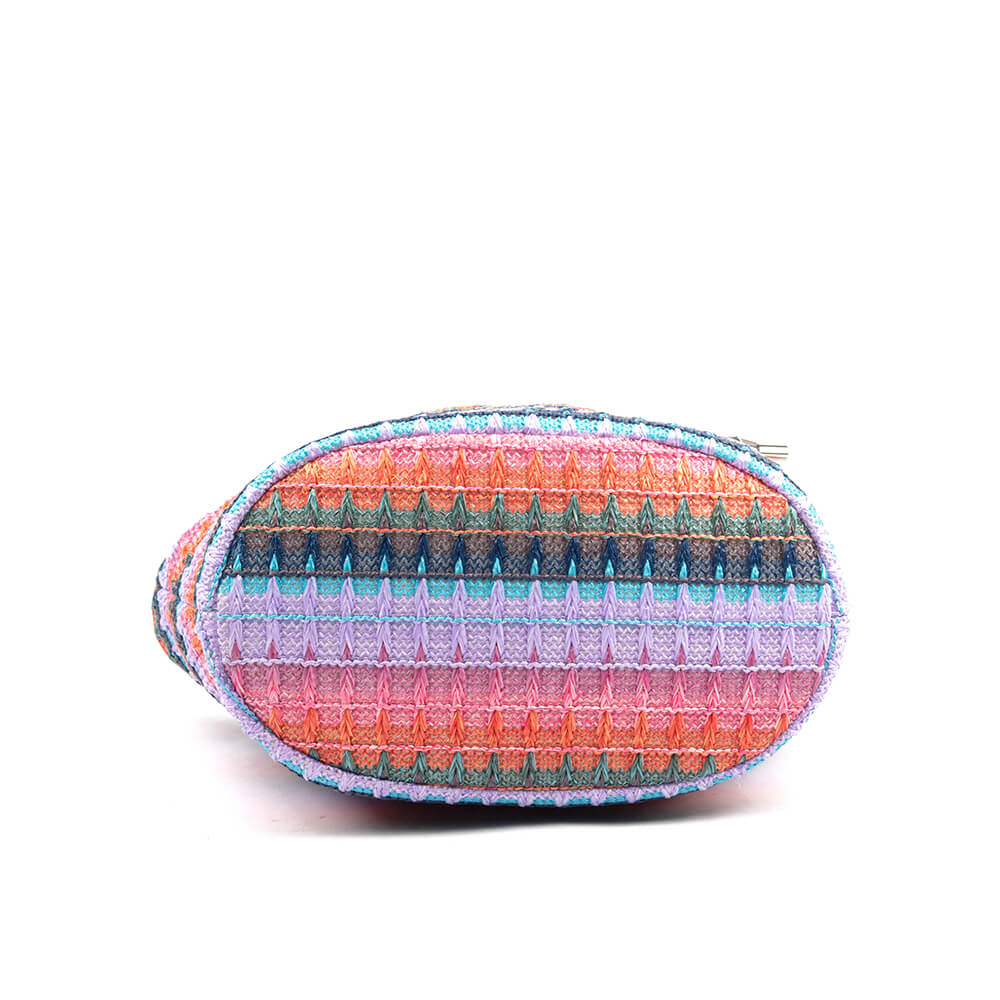 Boho woven handbag with geometric knit texture in warm and cool tones