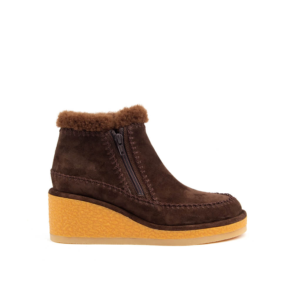 Women's dark brown shearling suede wedge ankle boots pair
