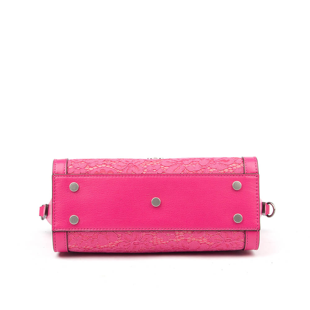 Hot pink leather flap bag with lace pocket and removable crossbody strap
